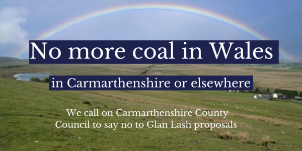 Picture of hills with a rainbow and blue sky with the words no more coal in Wales - in Carmarthenshire or elsewhere