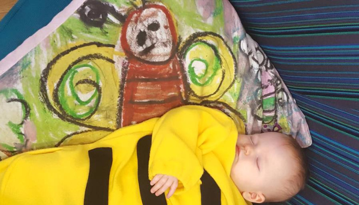 Baby in a bee costume