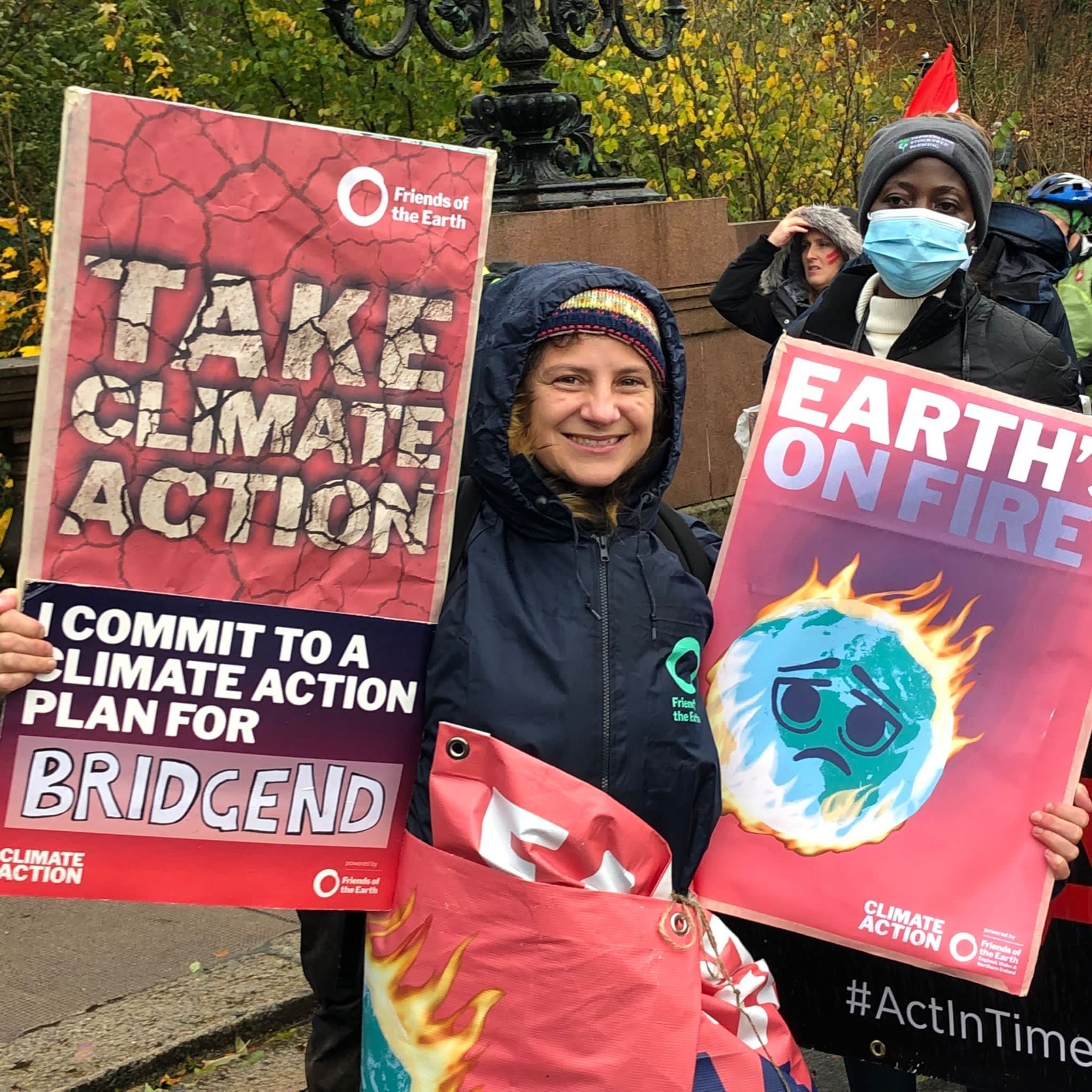 Person holding a climate change placard
