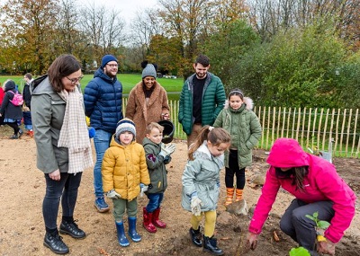 People planting a tiny forest in Caerphilly