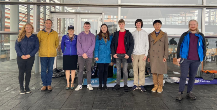 Picture of people standing outside the Senedd