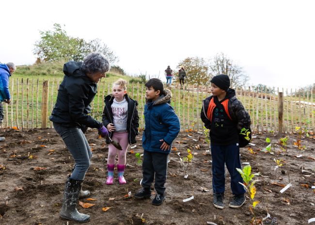 People planting Tiny Forest Caerffili