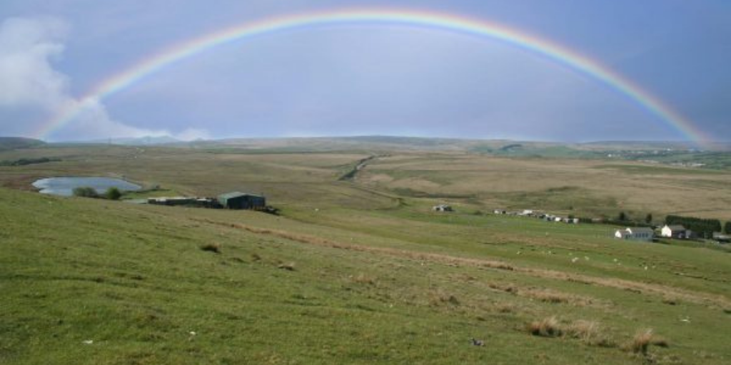 Rainbow over hills