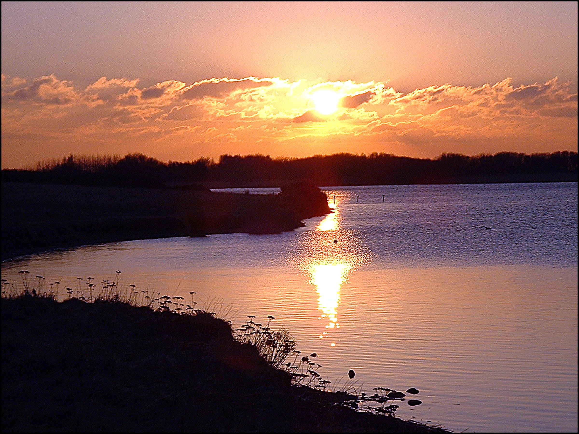 Kenfig Nature Reserve at Sunset in March 2003 by Robert Coorigan (Creative Commons)