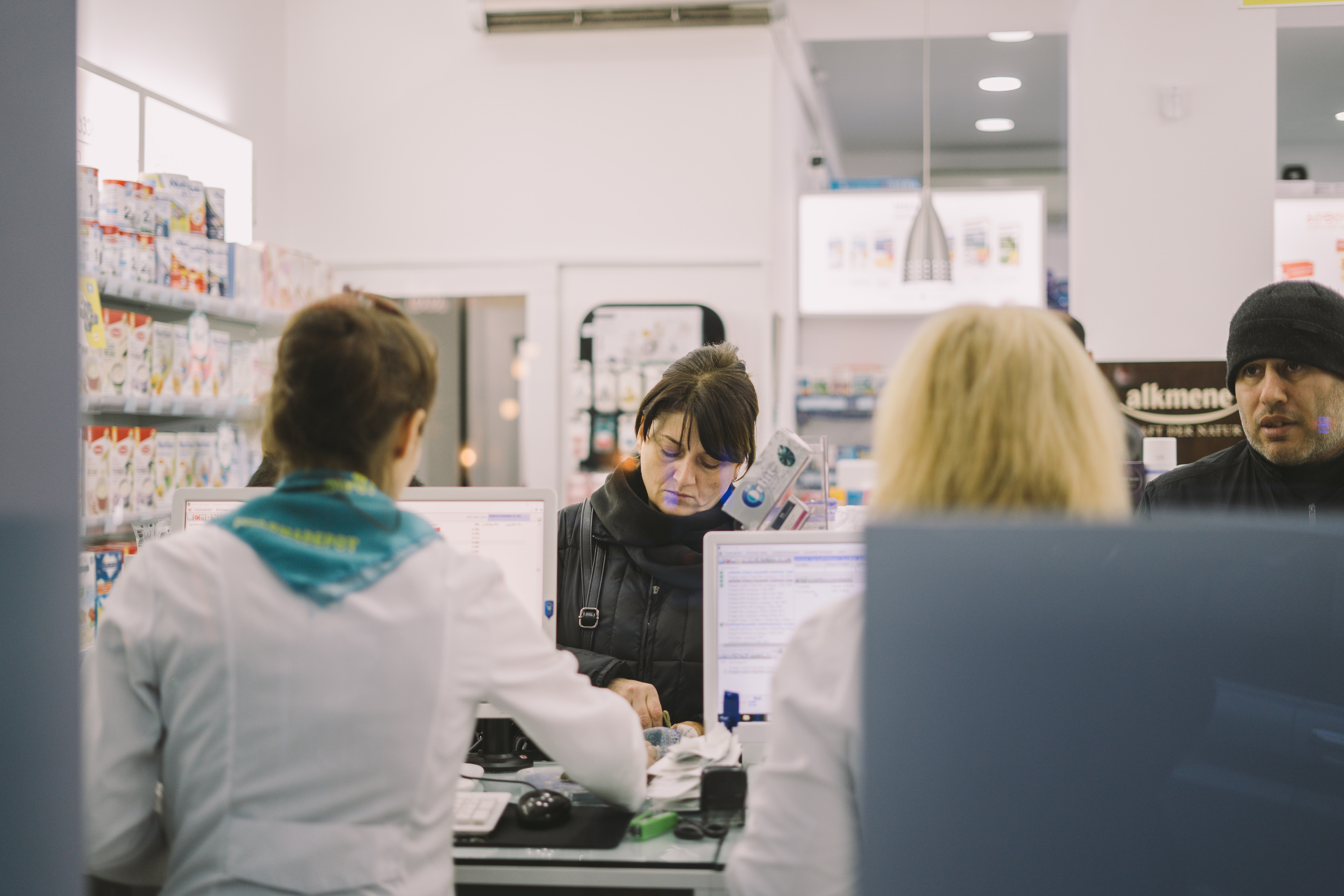 People in a pharmacy