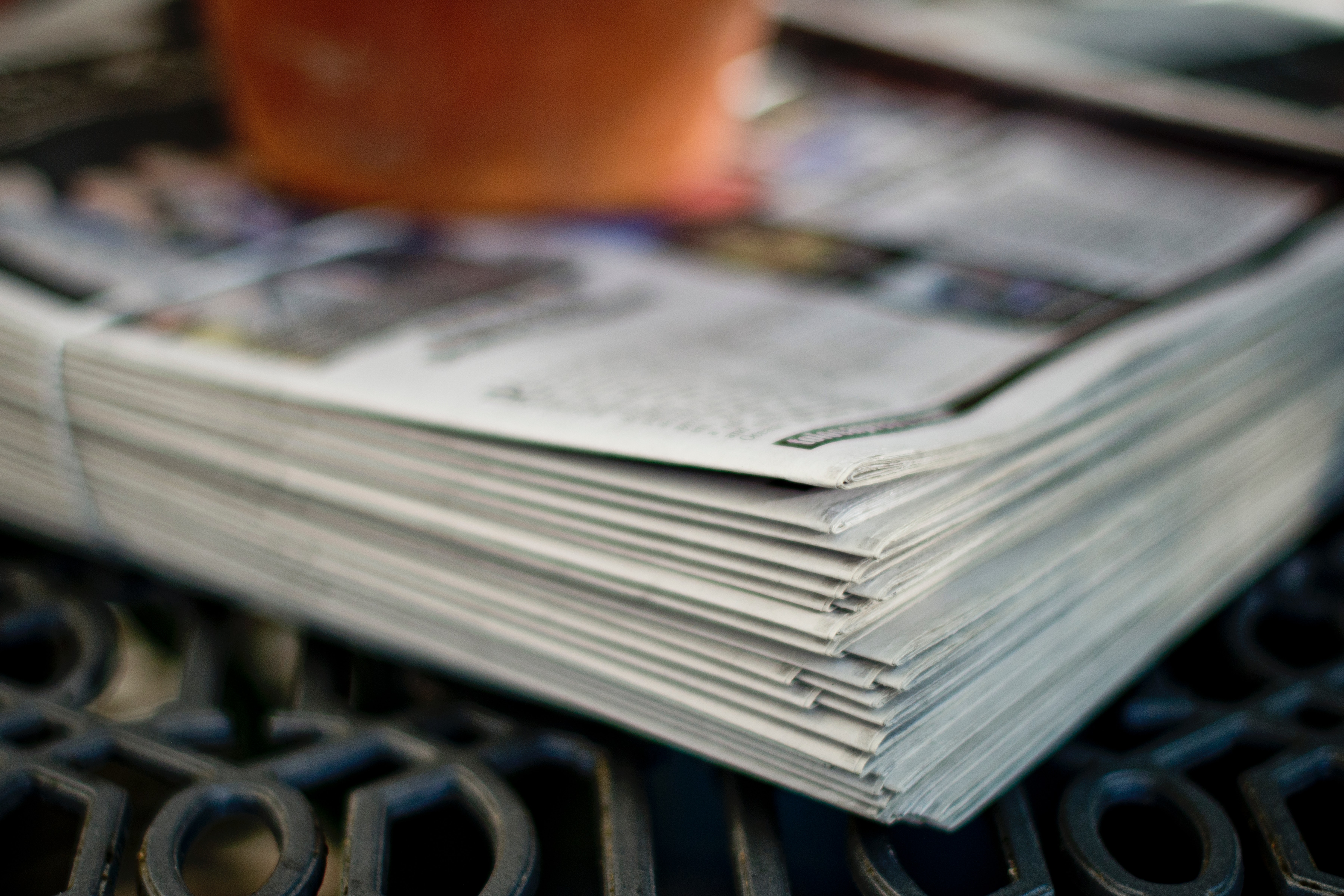 Stack of newspapers  - Photo by Tim Mossholder on Unsplash