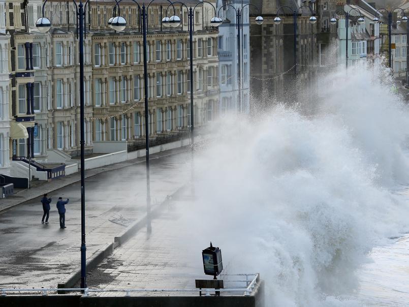 Waves crashing into the seafront at Aberystwyth
