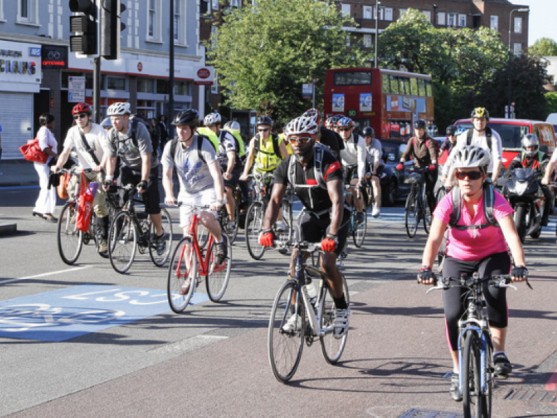 People cycling on a road