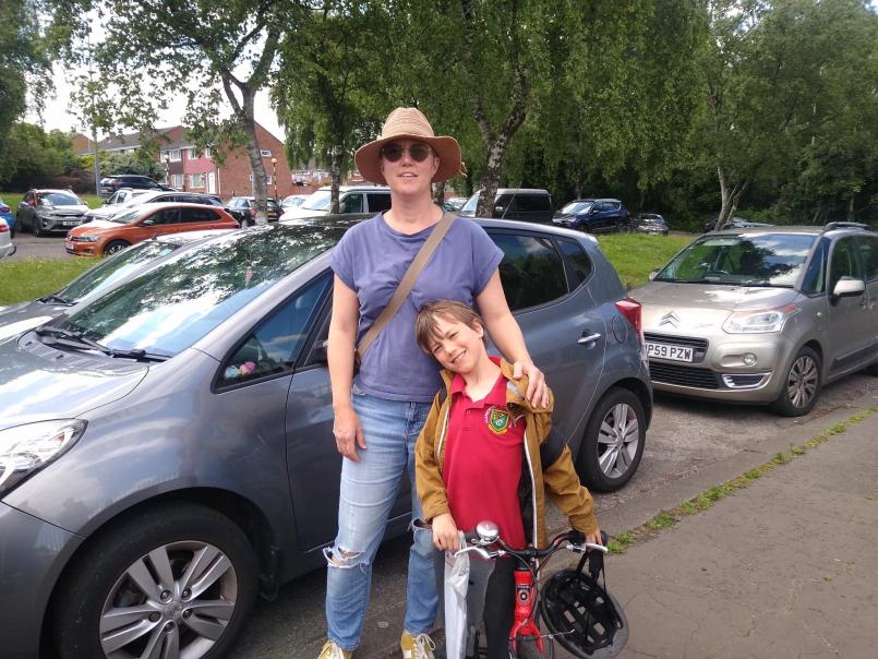 Mum from Cardiff with her son, walking to school