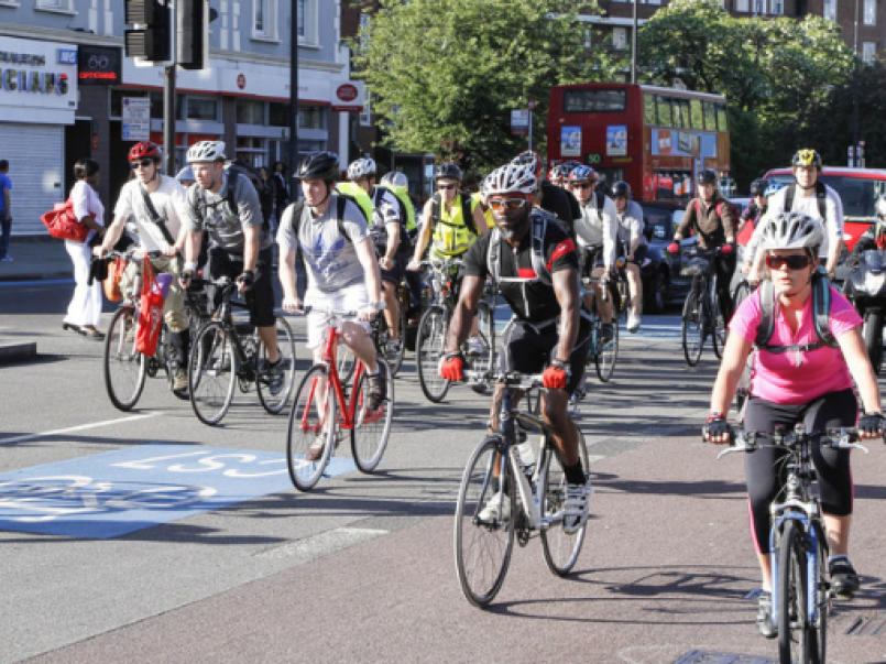 Picture of people cycling on a road