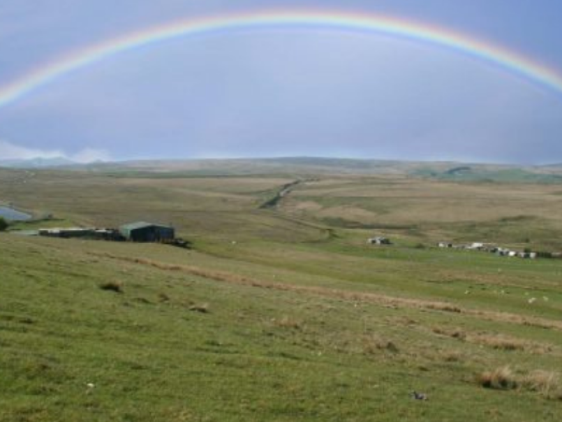 Rainbow over hills