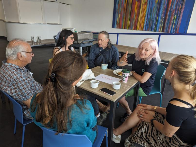 People talking around a table