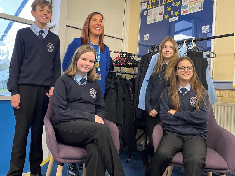 Picture of pupils and school uniform recycling scheme