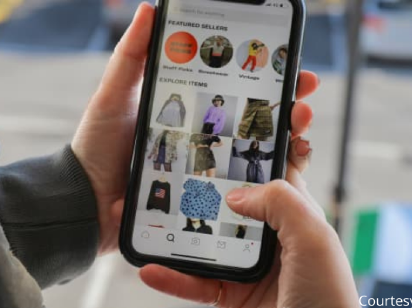 Mobile phone showing a clothing app