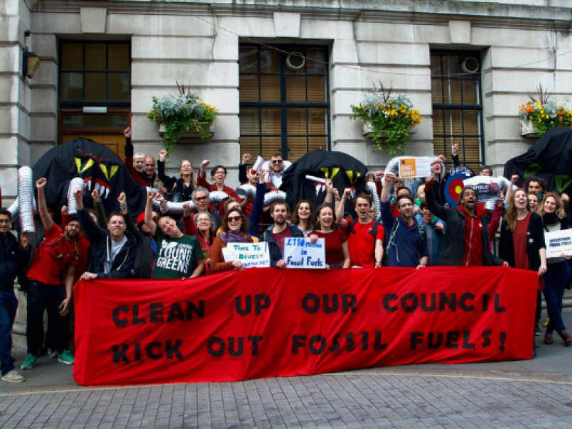 People protesting against councils investing in fossil fuels